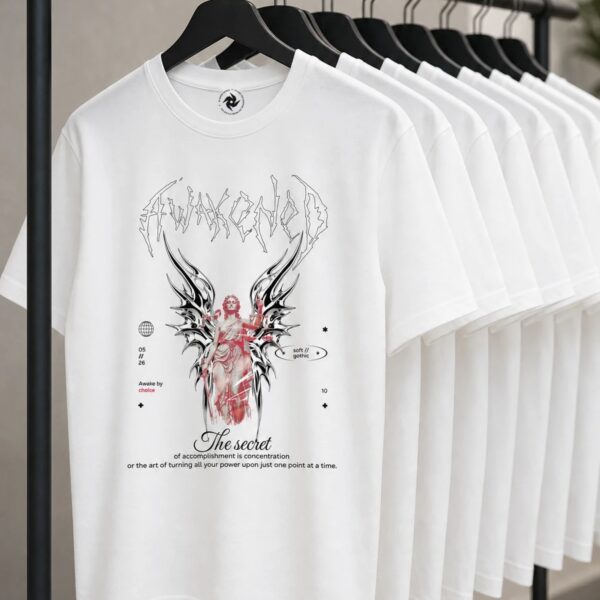 White Awakened soft gothic t-shirt on a clothing rack – Lady Justice with chrome wings, Banny Design
